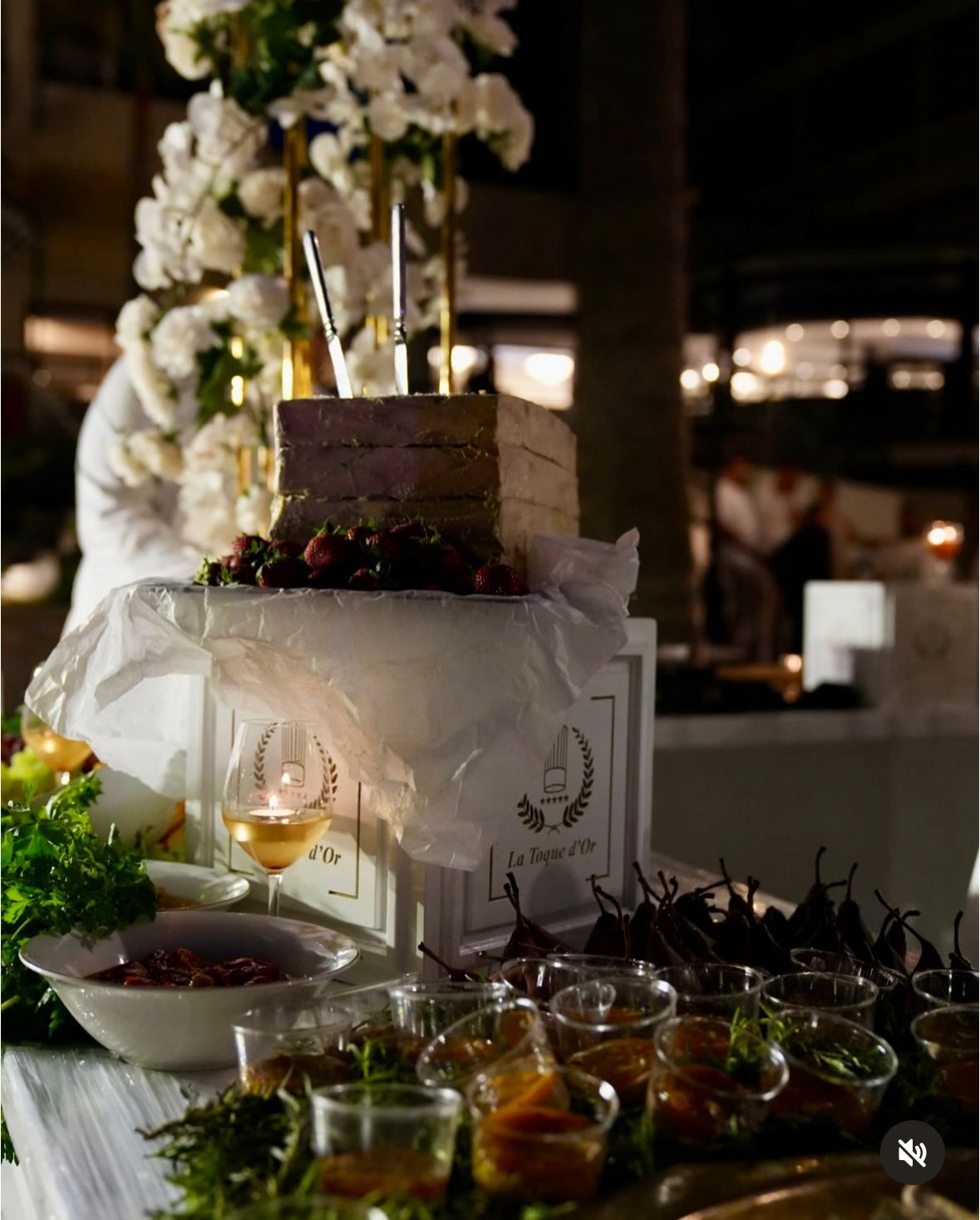 Candlelit dessert buffet with white flowers